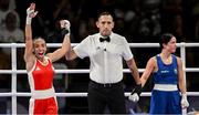 1 August 2024; Wassila Lkhadiri of Team France, left, reacts after her victory over Daina Moorehouse of Team Ireland in their women's 50Kg round of 16 bout at the North Paris Arena during the 2024 Paris Summer Olympic Games in Paris, France. Photo by David Fitzgerald/Sportsfile