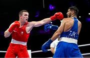 1 August 2024; Jack Marley of Team Ireland, left, in action against Davlat Boltaev of Team Tajikistan during their men's 92kg quarter-finals at the North Paris Arena during the 2024 Paris Summer Olympic Games in Paris, France. Photo by David Fitzgerald/Sportsfile