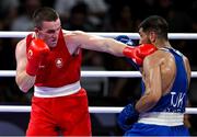 1 August 2024; Jack Marley of Team Ireland, left, in action against Davlat Boltaev of Team Tajikistan during their men's 92kg quarter-finals at the North Paris Arena during the 2024 Paris Summer Olympic Games in Paris, France. Photo by Brendan Moran/Sportsfile