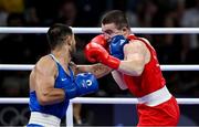 1 August 2024; Jack Marley of Team Ireland, right, in action against Davlat Boltaev of Team Tajikistan during their men's 92kg quarter-finals at the North Paris Arena during the 2024 Paris Summer Olympic Games in Paris, France. Photo by Brendan Moran/Sportsfile