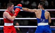 1 August 2024; Jack Marley of Team Ireland, left, in action against Davlat Boltaev of Team Tajikistan during their men's 92kg quarter-finals at the North Paris Arena during the 2024 Paris Summer Olympic Games in Paris, France. Photo by Brendan Moran/Sportsfile