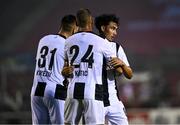 1 August 2024; Zurich players, from right, Cheveyo Tsawa, Nikola Katic and Mirlind Kryeziu after their side's victory in the UEFA Conference League second qualifying round second leg match between Shelbourne and FC Zurich at Tolka Park in Dublin. Photo by Harry Murphy/Sportsfile