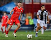 1 August 2024; John O'Sullivan of Shelbourne in action against Bledian Krasniqi of FC Zurich during the UEFA Conference League second qualifying round second leg match between Shelbourne and FC Zurich at Tolka Park in Dublin. Photo by Thomas Flinkow/Sportsfile