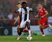 1 August 2024; Emmanuel Umeh of FC Zurich feels pressure from JJ Lunney of Shelbourne during the UEFA Conference League second qualifying round second leg match between Shelbourne and FC Zurich at Tolka Park in Dublin. Photo by Thomas Flinkow/Sportsfile