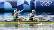 2 August 2024; Fintan McCarthy, left, and Paul O'Donovan of Team Ireland celebrate winning the men's lightweight double sculls finals A at Vaires-sur-Marne Nautical Stadium during the 2024 Paris Summer Olympic Games in Paris, France. Photo by Brendan Moran/Sportsfile