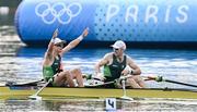 2 August 2024; Fintan McCarthy, left, and Paul O'Donovan of Team Ireland celebrate winning the men's lightweight double sculls finals A at Vaires-sur-Marne Nautical Stadium during the 2024 Paris Summer Olympic Games in Paris, France. Photo by David Fitzgerald/Sportsfile
