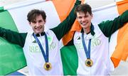2 August 2024; Paul O'Donovan, left, and Fintan McCarthy of Team Ireland celebrate with their gold medals after winning the men's lightweight double sculls A final at Vaires-sur-Marne Nautical Stadium during the 2024 Paris Summer Olympic Games in Paris, France. Photo by David Fitzgerald/Sportsfile
