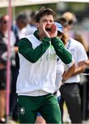 2 August 2024; Fintan McCarthy of Team Ireland cheers on his teammates Margaret Cremen and Aoife Casey in their women's lightweight double sculls finals A while awaiting his medal ceremony at Vaires-sur-Marne Nautical Stadium during the 2024 Paris Summer Olympic Games in Paris, France. Photo by Brendan Moran/Sportsfile