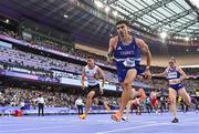 2 August 2024; Teo Andant of Team France takes the baton from teammate Louise Maraval during the 4x400m mixed relay round 1 at the Stade de France during the 2024 Paris Summer Olympic Games in Paris, France. Photo by Sam Barnes/Sportsfile