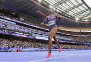 2 August 2024; Kaylyn Brown of Team USA crosses the line to win the 4x400m mixed relay round 1 at the Stade de France during the 2024 Paris Summer Olympic Games in Paris, France. Photo by Sam Barnes/Sportsfile