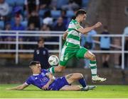 2 August 2024; Neil Farrugia of Shamrock Rovers is tackled by Darragh Leahy of Waterford during the SSE Airtricity Men's Premier Division match between Waterford and Shamrock Rovers at the Regional Sports Centre in Waterford. Photo by Michael P Ryan/Sportsfile