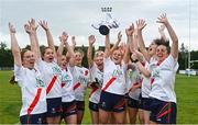3 August 2024; Milltown, Kildare, captain Lisa Byrne lifts the Junior Championship cup alongside her teammates at the O’Neills All-Ireland Club 7s competitions at Naomh Mearnóg and St Sylvester’s GAA clubs in Dublin.  Photo by Ben McShane/Sportsfile
