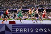 3 August 2024; Luke McCann, third from left, and Cathal Doyle, third from right, of Team Ireland in action during the men's 1500m repechage at the Stade de France during the 2024 Paris Summer Olympic Games in Paris, France. Photo by Sam Barnes/Sportsfile