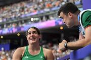 4 August 2024; Nicola Tuthill of Team Ireland and coach Killian Barry during the women's hammer throw qualification round at the Stade de France during the 2024 Paris Summer Olympic Games in Paris, France. Photo by Sam Barnes/Sportsfile