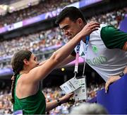 4 August 2024; Nicola Tuthill of Team Ireland and coach Killian Barry during the women's hammer throw qualification round at the Stade de France during the 2024 Paris Summer Olympic Games in Paris, France. Photo by Sam Barnes/Sportsfile