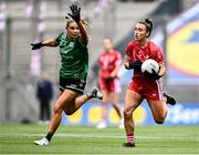 4 August 2024; Ceire Nolan of Louth in action against Brenda Bannon of Fermanagh during the TG4 All-Ireland Ladies Football Junior Championship final match between Fermanagh and Louth at Croke Park in Dublin. Photo by Piaras Ó Mídheach/Sportsfile