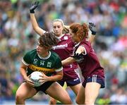 4 August 2024; Emma Dineen of Kerry is tackled by Sarah Ní Loingsigh, right, and Ailbhe Davoren of Galway during the TG4 All-Ireland Ladies Football Senior Championship final match between Galway and Kerry at Croke Park, Dublin. Photo by Ray McManus/Sportsfile