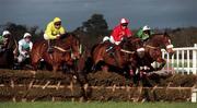 8 February 1998; Runners and riders, from left, Noble Thyne, with Thomas Treacy up, All The Vowels, with Barry Gerraghty up, and Tom Kenny, with David Casey up, jump the last first time round in the T.C.Matthews/Ulster Carpets Extended Handicap Hurdle during the horse racing from Leopardstown in Dublin. Photo by Matt Browne/Sportsfile