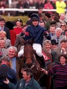 18 March 1998; Andrew Thornton celebrates on French Holly as they enter the parade ring after winning the Royal & Sunalliances Novice Hurdle during day two of the Cheltenham Racing Festival at Prestbury Park in Cheltenham, England. Photo by Matt Browne/Sportsfile