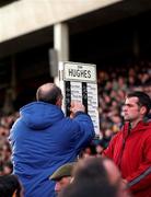 26 December 1998; A bookie is seen marking the race card during the Leopardstown Christmas Festival Day One at Leopardstown Racecourse in Dublin. Photo by Ray McManus/Sportsfile
