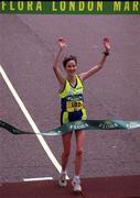 26 April 1998; Catherina McKiernan of Ireland crosses the line to win the London Marathon in London, England. Photo by Brendan Moran/Sportsfile