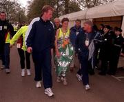 26 April 1998; Catherina McKiernan of Ireland with boyfriend Damien O'Reilly, left, and coach Joe Doonan after winning the London Marathon in London, England. Photo by Brendan Moran/Sportsfile