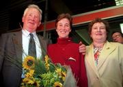 27 April 1998; Catherina McKiernan with her parents John and Kathleen on her return from winning the London Marathon at Dublin Airport. Photo by Brendan Moran/Sportsfile