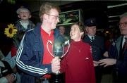 27 April 1998; Catherina McKiernan with her boyfriend Damien O'Reilly on her return from winning the London Marathon at Dublin Airport. Photo by Brendan Moran/Sportsfile