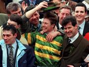 18 March 1998; Jockey Charlie Swan and owner JP McManus, right, after winning the Smurfit Champion Hurdle Challenge race with Istabraq during day two of the Cheltenham Racing Festival at Prestbury Park in Cheltenham, England. Photo by Matt Browne/Sportsfile