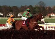 The Hennessy Cognac Gold Cup Leopardstown 8/2/1998 Dorans Pride and Richard Dunwoody come over the last to win from Dun Belle and Tommy Tracy in second Photograph Matt Browne SPORTSFILE *** Local Caption *** 8 February 1998; x during the horse racing from Leopardstown in Dublin. Photo by Matt Browne/Sportsfile