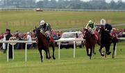 28 June 1998; Dream Well, with Cash Asmussen up, left, race clear of Risk Material, with Seamus Heffernan up, centre, and City Honours with Frankie Dettori up, on their way to winning the Budweiser Irish Derby during Horse Racing from The Curragh in Kildare. Photo by Damien Eagers/Sportsfile