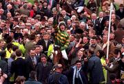 18 March 1998; Charlie Swan celebrates on Istabraq as they enter the parade ring after winning the Smurfit Champion Hurdle Challenge race during day two of the Cheltenham Racing Festival at Prestbury Park in Cheltenham, England. Photo by Matt Browne/Sportsfile