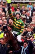 17 March 1998; Charlie Swan celebrates on Istabraq after winning the Smurfit Champion Hurdle during day one of the Cheltenham Racing Festival at Prestbury Park in Cheltenham, England. Photo by Matt Browne/Sportsfile