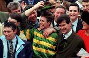 17 March 1998; Jockey Charlie Swan celebrates with owner JP McManus after winning the Smurfit Champion Hurdle on Istabraq during day one of the Cheltenham Racing Festival at Prestbury Park in Cheltenham, England. Photo by Matt Browne/Sportsfile