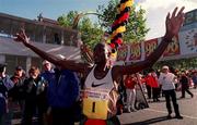26 October 1998; Joshua Kipkemboi of Kenya celebrates after winning the 98FM Dublin City Marathon in Dublin. Photo by Brendan Moran/Sportsfile