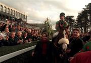 8 February 1998; Richard Dunwoody makes his way back into the parade ring on Dorans Pride after winning the Hennessy Cognac Gold Cup during the horse racing from Leopardstown in Dublin. Photo by Matt Browne/Sportsfile