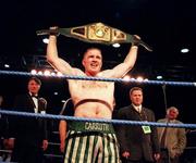 19 September 1998; Michael Carruth celebrates with the WAA Welterweight Championship belt after defeating Scott Dixon at the National Basketball Arena in Tallaght, Dublin. Photo by David Maher/Sportsfile
