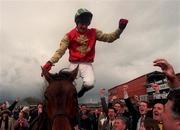 13 April 1998; Paul Carberry celebrates on Bobbyjo after they won the Irish Grand National during the Fairyhouse Easter Festival - Irish Grand National day at Fairyhouse Racecourse in Ratoath, Meath. Photo by Matt Browne/Sportsfile