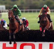 13 April 1998; Bobbyjo, with Paul Carberry up, right, clear the last ahead of Papillon, with Ruby Walsh up, on their way to winning the Irish Grand National Steeplechase during the Fairyhouse Easter Festival - Irish Grand National day at Fairyhouse Racecourse in Ratoath, Meath. Photo by Damien Eagers/Sportsfile