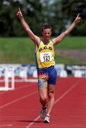 25 July 1998; Pierce O'Callaghan celebrates as he crosses the line to win the Men's 10000m racewalk during the BLÉ National Track & Field Championships at Morton Stadium in Santry, Dublin. Photo by Matt Browne/Sportsfile