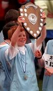 21 May 1998; Sam Murphy of Burrow N.S, Sutton, Dublin, celebrates with the shield after his team won the Boys U10 relay race during the Cumann na mBunscoil Sports at Morton Stadium in Santry, Dublin. Photo by Brendan Moran/Sportsfile