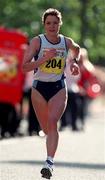 26 October 1998; Teresa Duffy of Ireland on her way to winning the 98FM Dublin City Marathon in Dublin. Photo by Brendan Moran/Sportsfile