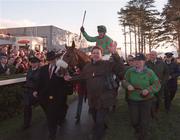 28 December 1998; Owner Tom Doran, centre, celebrates along with horse Dorans Pride and jockey Paul Carberry as they enter the parade ring after winning the Ericsson Steeplechase during the Leopardstown Christmas Festival Day Three at Leopardstown Racecourse in Dublin. Photo by Matt Browne/Sportsfile