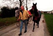 2 July 1997; Trainer Tom Taaffe with horses Delphe Lodge, left, and Snow Falcon at his stables in Portree, Kildare. Photo by David Maher/Sportsfile