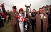 30 April 1998; Jockey Richard Johnson celebrates with Zafarabad, trainer David Nicholson, left, and owner Roger Baines after winning the I.A.W.S Champion Four Year Old Hurdle during the Punchestown Festival Gold Cup day at Punchestown Racecourse in Kildare. Photo by Matt Browne/Sportsfile