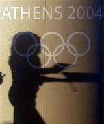 13 August 2004; The shadow of a spectator is cast on a sign for Athens 2004 as they make their way to the Opening Ceremony of the XXVII Olympiad. Games of the XXVII Olympiad, Athens Summer Olympics Games 2004, Athens, Greece. Picture credit; Brendan Moran / SPORTSFILE