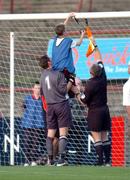 13 August 2004; Drogheda United goalkeeper Gary Rogers gives a lift to a young ballboy to repair the net before the start of the game. eircom league, Premier Division, Bohemians v Drogheda United, Dalymount Park, Dublin. Picture credit; David Maher / SPORTSFILE