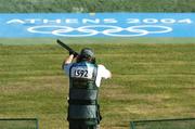 14 August 2004; Ireland's Derek Burnett in action during the Men's Trap Shooting Qualification. Markopoulo Olympic Shooting Centre. Games of the XXVII Olympiad, Athens Summer Olympics Games 2004, Athens, Greece. Picture credit; Brendan Moran / SPORTSFILE