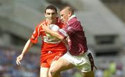 14 August 2004; Alan Mangan, Westmeath, in action against James Donaghy, Derry. Bank of Ireland Senior Football Championship Quarter-Final, Westmeath v Derry, Croke Park, Dublin. Picture credit; Damien Eagers / SPORTSFILE
