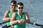 15 August 2004; Ireland's Gearoid Towey and Sam Lynch, left,  during their heat of the Lightweight Men's Double Sculls which they won in a time of 6.16.63 to qualify for the semi-finals. Schinias Olympic Rowing Centre. Games of the XXVII Olympiad, Athens Summer Olympics Games 2004, Athens, Greece. Picture credit; Brendan Moran / SPORTSFILE